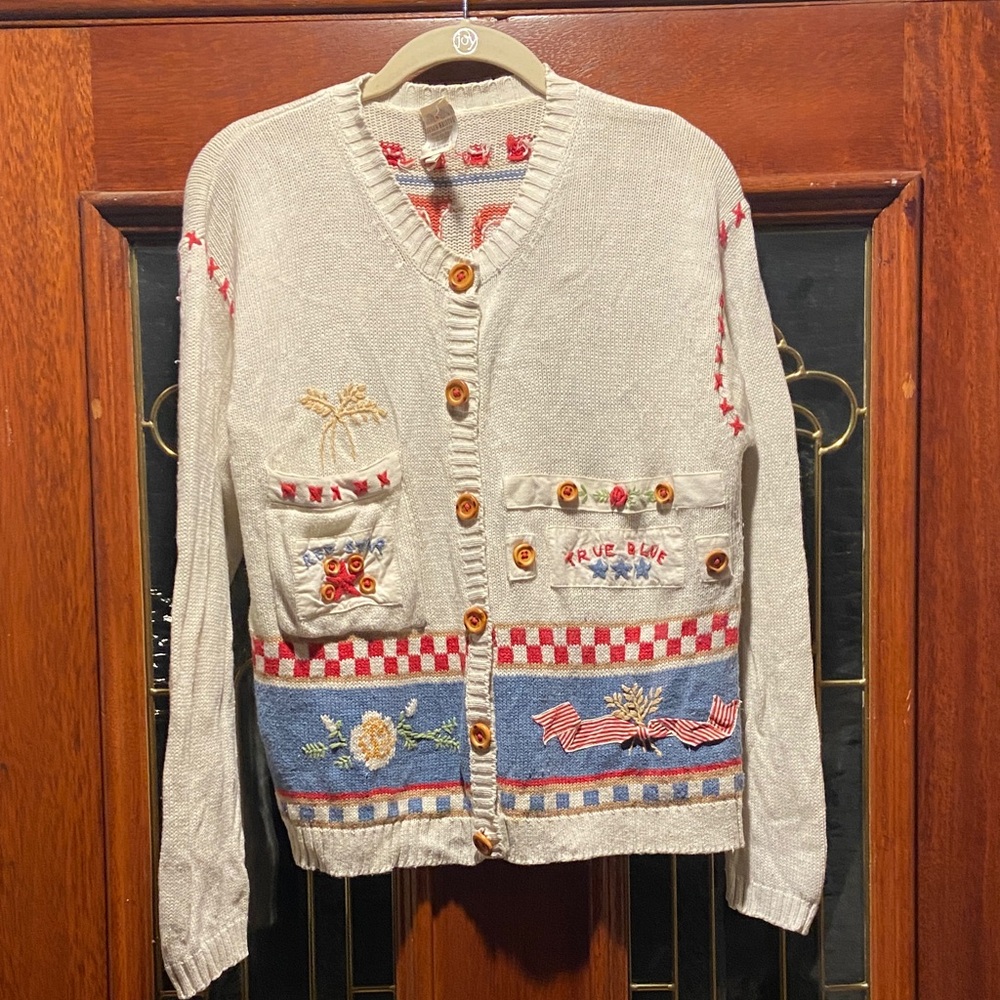 Susan Bristol Cream Cardigan with Red and Blue Accents